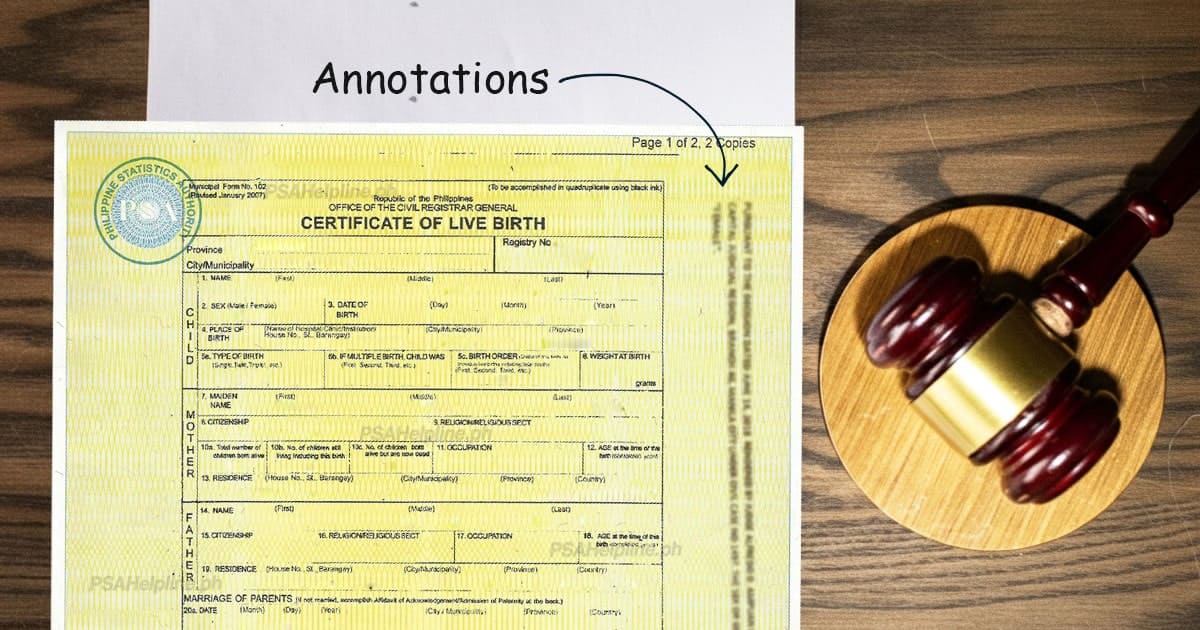 PSA Certificate of Live Birth document next to a judge's gavel, with an arrow pointing to the 'Annotations' section.